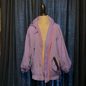 Purple windbreaker.